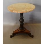 A William IV Mahogany Pedestal Table, the variegated marble top above a tulip carved column,