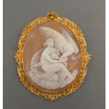 A 19th Century Large Cameo Brooch depicting a classical figure with an eagle within a yellow metal