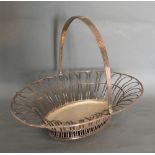 A George III Silver Large Fruit Basket by James Young of pierced wire form and with swing handle