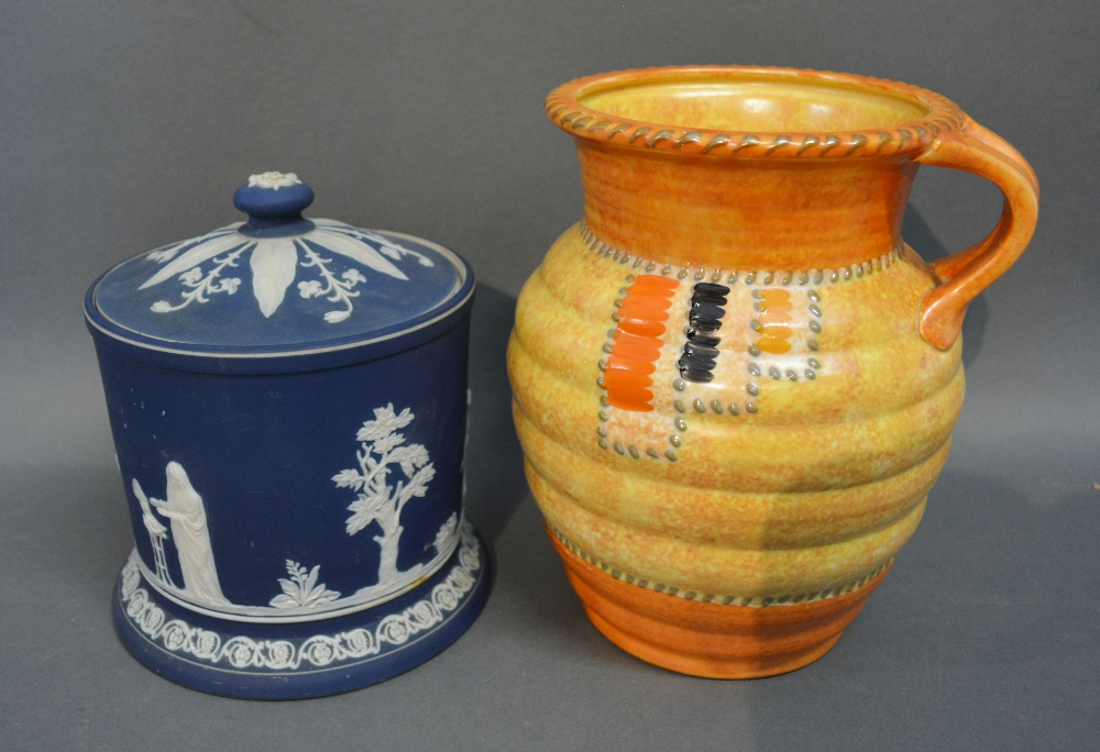 A Tunstall Jasper Ware Style Biscuit Barrel decorated in relief together with a Crown Ducal vase