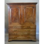 A George III Mahogany Press Cupboard converted to Hanging with a moulded cornice above two shaped