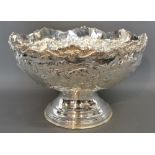 A Large Silver Plated Punch Bowl with embossed decoration and circular pedestal base,