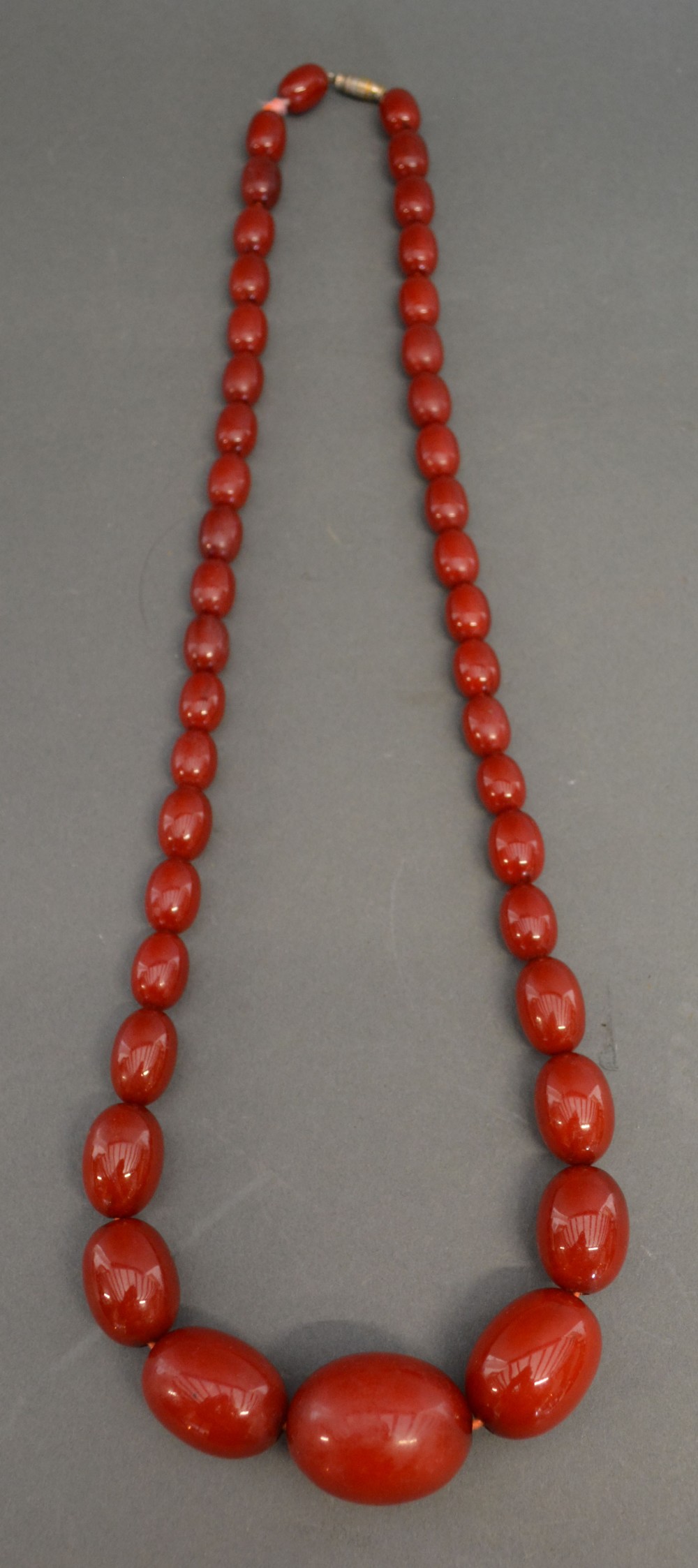 An Early 20th Century Graduated Amber Bead Necklace