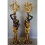 A Pair of Blackamoor Floor Standing Candelabrum,