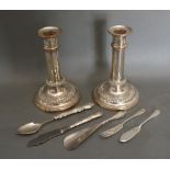 A Pair of Silver Plated Dwarf Candlesticks together with a small collection of silver plated flat