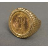 A Victorian Gold Half Sovereign, shield back dated 1887 within a gold ring mount, 11.