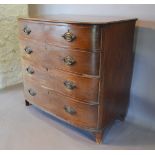 An Early 19th Century Mahogany Semi-Bow Fronted Chest of two short and three long graduated drawers