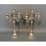 A Pair of Silver Plated Five Branch Candelabra with Circular Pedestal Bases,