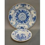 An 18th Century Delft Circular Dish, decorated in under glaze blue,