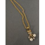 A 9ct Gold Diamond and Pearl Set Pendant