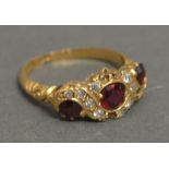 An 18ct Yellow Gold Ruby and Diamond Rin