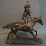 A Composition Bronzed Model in the form of a Horse and Jockey, titled 'The Unexpected Winner',