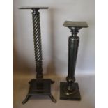 A Victorian Ebonised Torchere, with tulip carved and spiral column raised upon outswept legs,