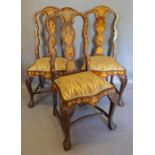 A Set of Three Dutch Marquetry Inlaid Side Chairs,