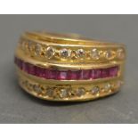 An 18ct Gold Ruby and Diamond Band Ring,