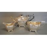 An Edwardian Silver Three Piece Tea Service, comprising teapot,