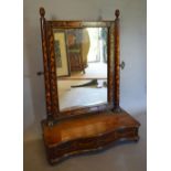 A 19th Century Dutch Marquetry Swing Frame Dressing Mirror with serpentine box base with drawer