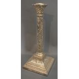 An Edwardian Silver Lamp Base of Corinthian Form with Vine upon a square stepped base,