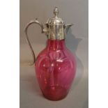 A Cranberry Glass Claret Jug with Silver Plated Mounts,