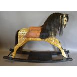 A Painted Dapple Grey Rocking Horse with mane and leather saddle,
