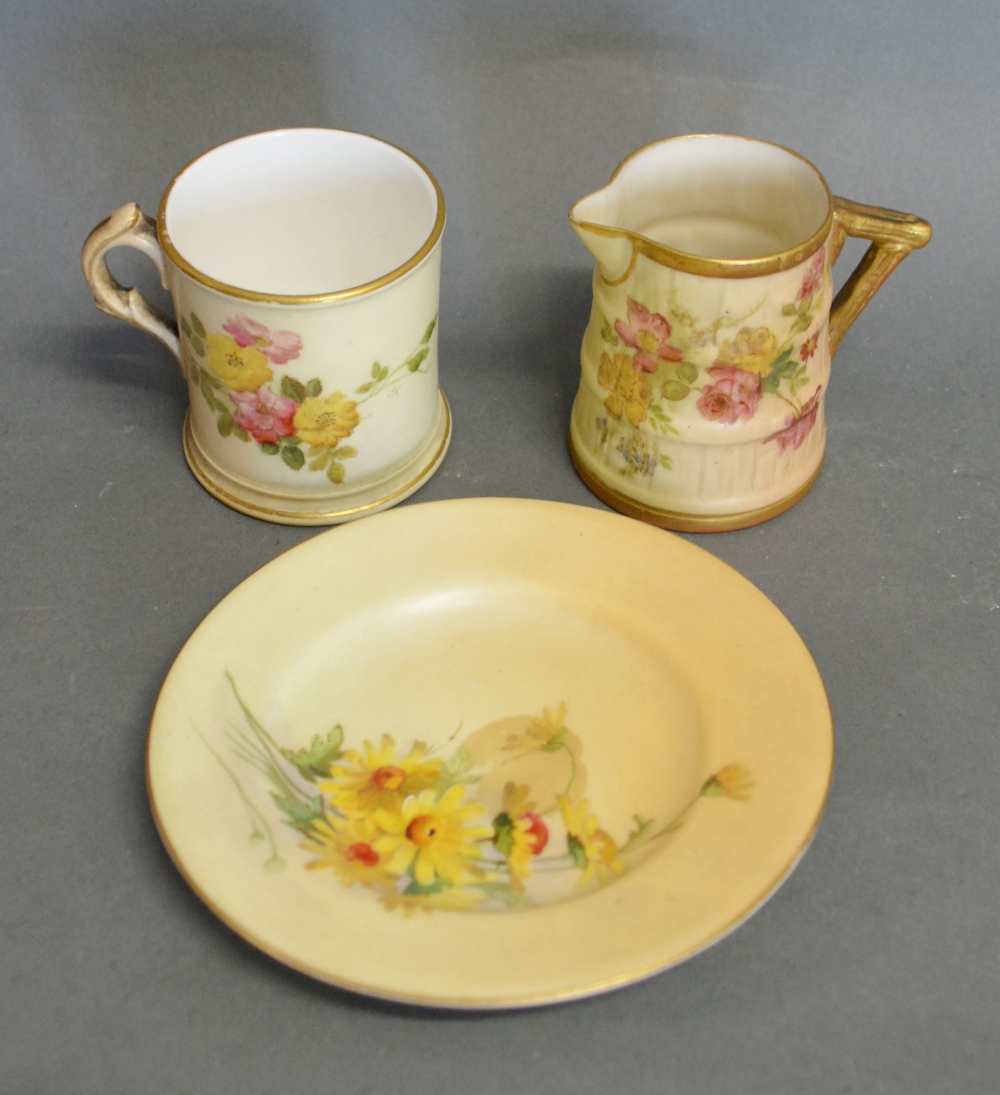 A Royal Worcester Blush Ivory Small Mug hand painted with summer flowers and highlighted with gilt