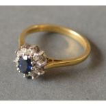 An 18ct Yellow Gold Diamond and Sapphire Cluster Ring,