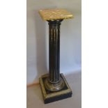 A 19th Century French Ebonised and Ormolu Mounted Torchere with an adjustable rouge marble square