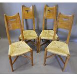 A Set of Four Arts and Crafts Elm High Back Dining Chairs by William Birch of High Wycombe with a