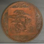 A Japanese Meiji Period Patinated Metal Plate depicting figures within a landscape,