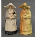 A Royal Worcester Blush Ivory Candle Extinguisher in the form of a Nun,