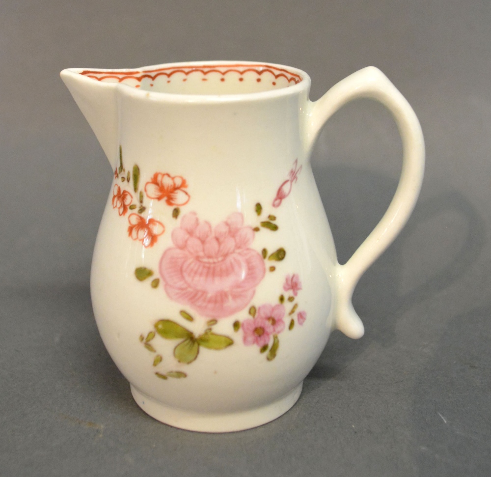 An 18th Century Lowestoft Sparrow Beak Jug, hand painted with summer flowers, circa 1770,