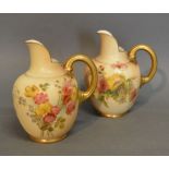 A Pair of Royal Worcester Blush Ivory Jug Vases each hand painted with summer flowers and