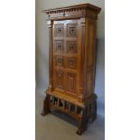 A Continental Walnut Cabinet,