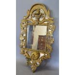 A 19th Century Carved Giltwood Girandole of Shaped Form,