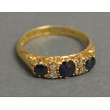 An 18ct Yellow Gold Sapphire and Diamond Band Ring,