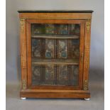 A Victorian Walnut Marquetry Inlaid and Gilt Metal Mounted Pier Cabinet with a single glazed door