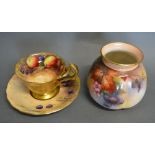 A Royal Worcester Cup and Saucer, hand painted with fruit and signed W.H.