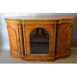 A Victorian Burr Walnut Marquetry Inlaid Credenza Cabinet with an arched glazed door enclosing