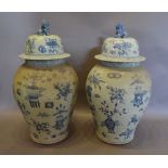 A Pair of Chinese Large Floor Standing Covered Vases,