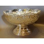 A Silver Plated Punch Bowl of Embossed Foliate Form with Circular Base,