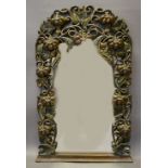 An Oak Wall Mirror, the pierced border mounted with fruit,