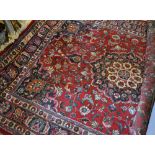 A North West Persian Style Large Woollen Carpet with a central medallion within an all over design