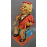 A Japanese Tin Plate Automaton 'Smokey McGregor' circa 1960,