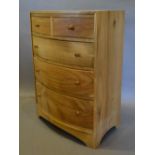 A Hardwood Bow Fronted Chest of two short and three long drawers with knob handles,