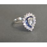 An 18ct White Gold Rose Cut Pear Shaped Diamond and Calibre Cut Sapphire Diamond Cluster Ring