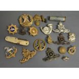A Collection of Military Badges and related items