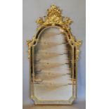 A 20th Century Gilt Framed Wall Mirror of Arched Form with Shell Foliate Surmount,