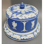 A Large Jasper Ware Cheese Dish and Cover decorated in relief with classical figures,