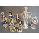 A German Porcelain Figure, together with six other similar figures,