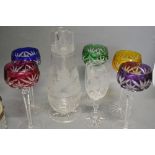 A Cut Glass Jug with Matching Pedestal Wine Glass,